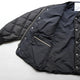 NANGA×MANUAL ALPHABET CMR REVERSE DOWN JACKET